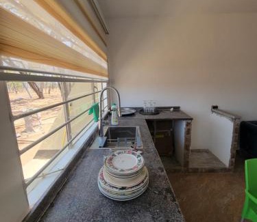Central Casa | Kitumba Lodge, 1 bed, kitchen & Lounge