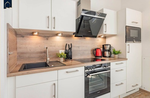 Ostvorpommern Apartamento | Kleines Kuschelnest - Beautiful vacation apartment with lagoon view and terrace