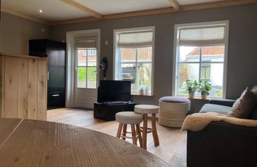 Jorwert Apartamento | Knus Afke appartement aan het water in Jorwert