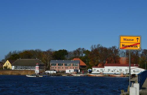 Waase Apartamento | Komfortable Ferienwohnung In Waase Mit Garten