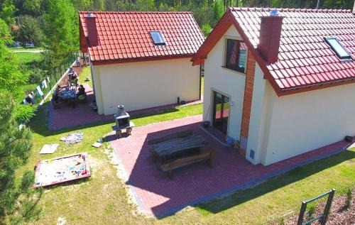 Kruklanki Apartamento | Komfortowe domki letniskowe nad jeziorem na Mazurach 2