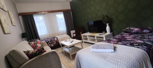 Rauma Casa | Kortteer vihreä huone