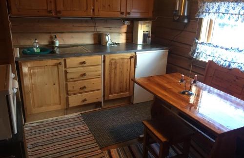 Dovre Casa | Koselig hytte med uthus på vakre Dovrefjell