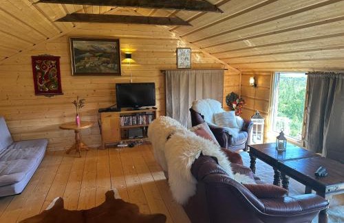 Dovre Casa | Koselig hytte med uthus på vakre Dovrefjell
