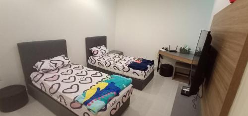 Batu Lintang Apartamento | Kozi Square Infinity Pool III