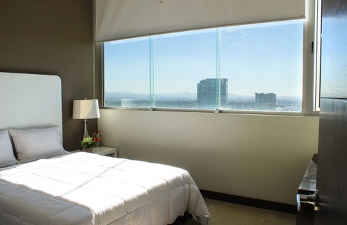 Zona de Angelópolis Cama Y Desayuno | Lâviu B&B Luxe Suites