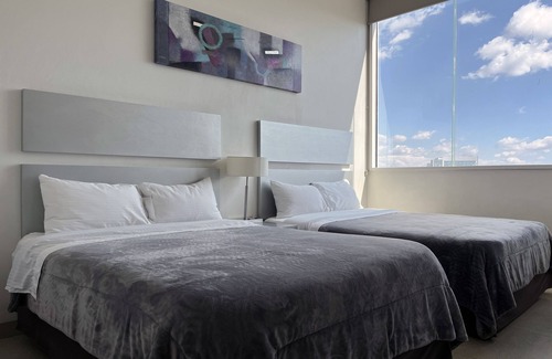Zona de Angelópolis Cama Y Desayuno | Lâviu B&B Luxe Suites