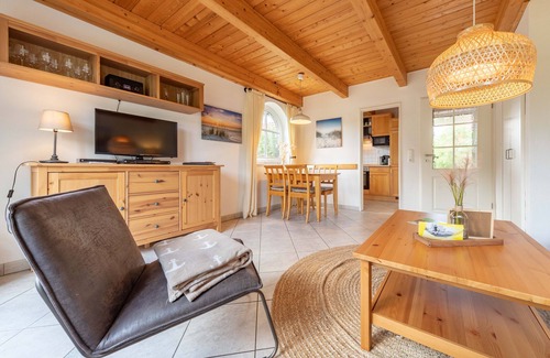Sturenburgshof Casa | Lüttje Huck - Ferienwohnung 2 mit Seeblick & Sauna