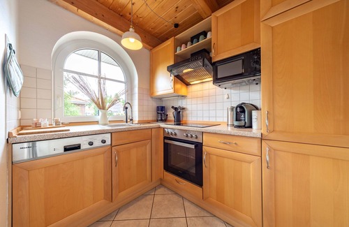 Sturenburgshof Casa | Lüttje Huck - Ferienwohnung 2 mit Seeblick & Sauna