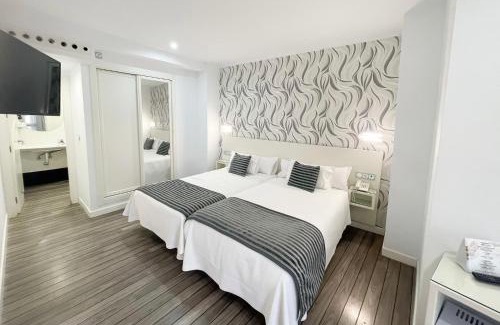 Centro Comercial Hotel | La Boutique Puerta Osario