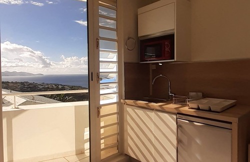 Case-Pilote Apartamento | La Capresse à Case Pilote Studio Saphir, Vue Imprenable sur la Côte Caraïbes