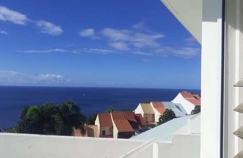 Case-Pilote Apartamento | La Capresse à Case Pilote Studio Saphir, Vue Imprenable sur la Côte Caraïbes