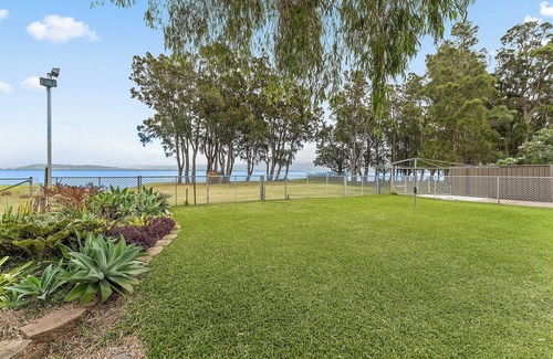 Primbee Casa | LA CASA SUL LAGO. Stunning lakefront home with direct access to lake Illawarra.