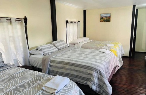 Corozal Hotel | La Delphina Bed and Breakfast Bar and Grill Deluxe Family Room