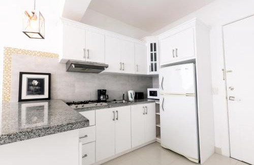 Bavaro Apartamento | LA PERLA STUDIOS with ROOFTOP POOL and SPA - PLAYA LOS CORALES