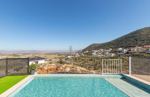 Coin Villa | La Piedra de Coin