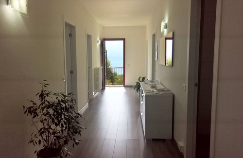 Sala Comacina Apartamento | Apartamento La Terrazza con impresionantes vistas al lago, plaza de coche privado nera comacina Is