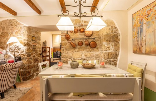 Cetona Casa | La Terrazza, Cetona, Tuscany, historic stone house with garden.