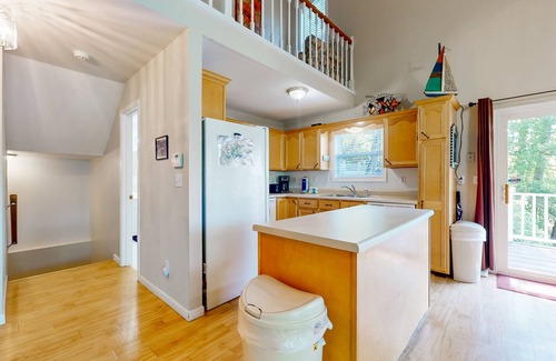 Big Creek Casa | Lake front home with games, fire pit, gas grill and dock