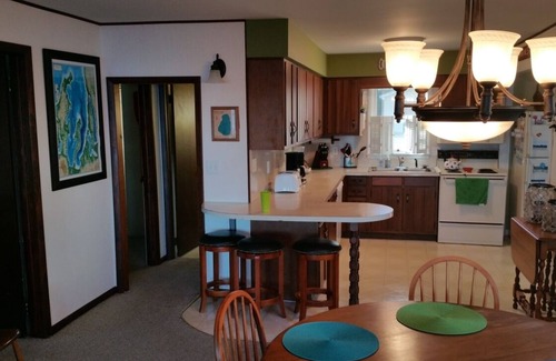 Elk Rapids Cabaña | Casa frente al lago en el hermoso lago de abedul