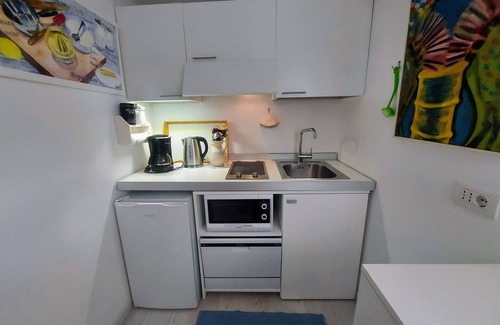 Frader Apartamento | Estudio de lujo con piscina en el lago de Garda