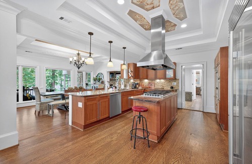 Buford Casa | Lake Home with Carriage House + Largest 2-Story Dock on Lanier