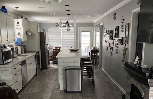 West Livingston Casa | Lake Livingston Waterfront home with boathouse and boat launch capability.
