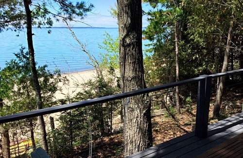 Ellsworth Casa | Lake Michigan Sunsets and sandy beachfront home on Grand Traverse Bay