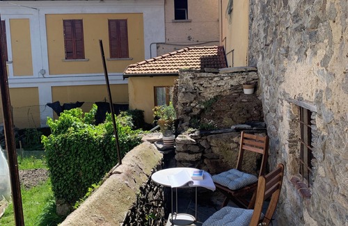Madonna del Sasso Casa | Lake Orta: Beautiful & cozy old village house with large loggia & garden