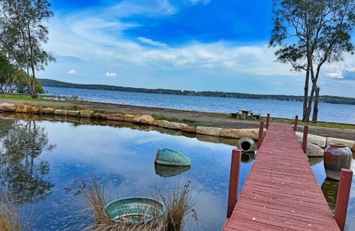 Dora Creek Villa | Lake Palm Retreat