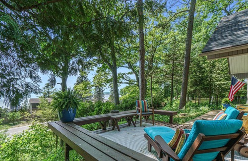 Lake Township Casa | Dog-friendly cabin with lake views, a patio, and a wood-burning stove