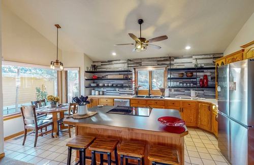 Greeley Casa | Lake-view home with gas fireplaces, inviting deck & dog-friendly yard