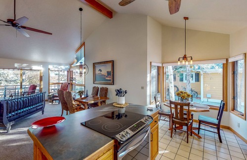 Greeley Casa | Lake-view home with gas fireplaces, inviting deck & dog-friendly yard