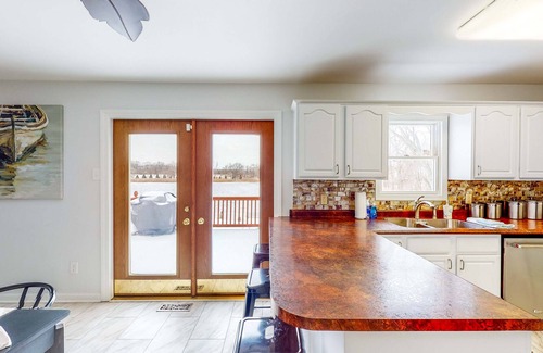 Portage Casa | Lake-view home with private hot tub, deck