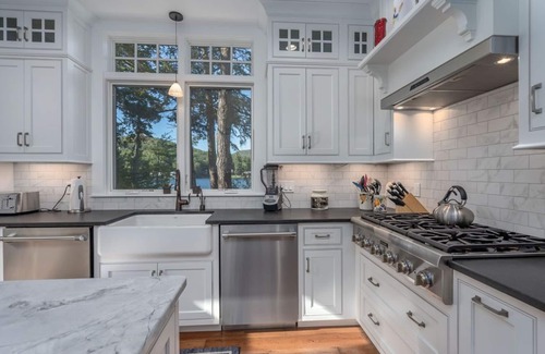 West Alton Casa | Lake Winnipesauke compound sleeps 22 in13 bedrooms stunning sunset views