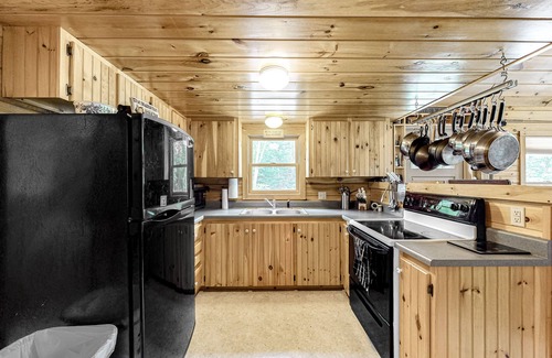 Greenville Cabina | Lakefront cabin on First Roach Pond with dock, lake view & firepit- dog-friendly