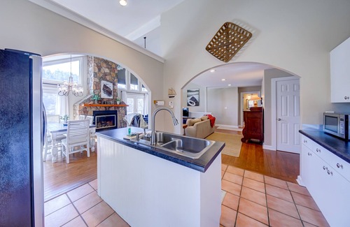 Lakemont Casa | Lakefront gem with deck, grill, boathouse/dock, fireplace, central AC, &WiFi