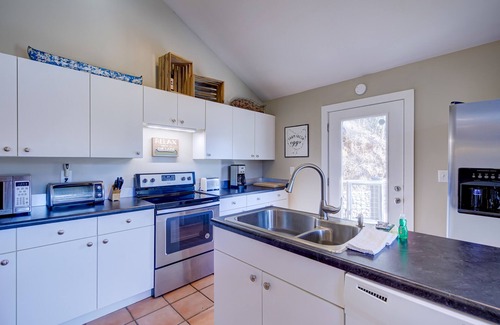 Lakemont Casa | Lakefront gem with deck, grill, boathouse/dock, fireplace, central AC, &WiFi