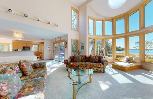 Charlevoix Casa | Lakefront home on Oyster Bay w/ private dock, beach, fire pit, & hammock
