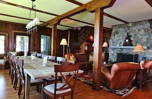 New Preston Casa | Lakefront Home set on five acres of land, deck, patio, lounge seating by...
