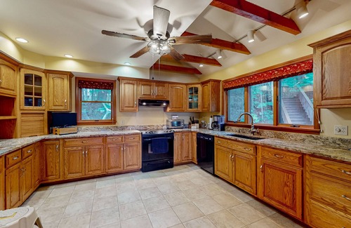 Raymond Casa | Lakefront home with amazing sunrise & sunset views, game tables & water toys
