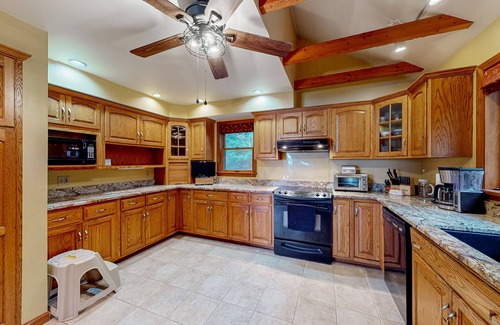 Raymond Casa | Lakefront home with amazing sunrise & sunset views, game tables & water toys