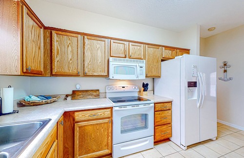 Marianna Casa | Lakefront home with amazing sunset/water view, private dock, & firepit