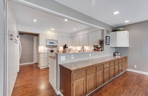 Olympia Casa | Lakefront home with canoe, kayaks, large deck, beach access, fireplace, & W/D