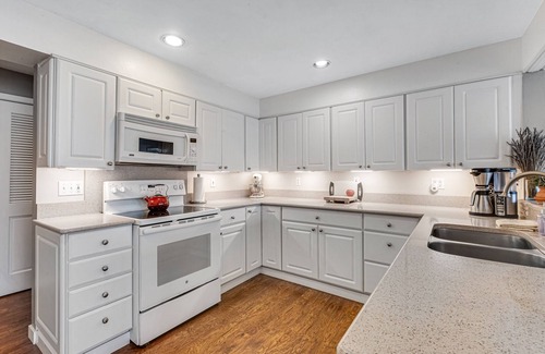 Olympia Casa | Lakefront home with canoe, kayaks, large deck, beach access, fireplace, & W/D