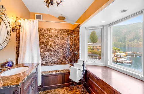 Bellingham Casa | Lakefront home with stunning view, hot tub, dock, decks, firepit & rec room