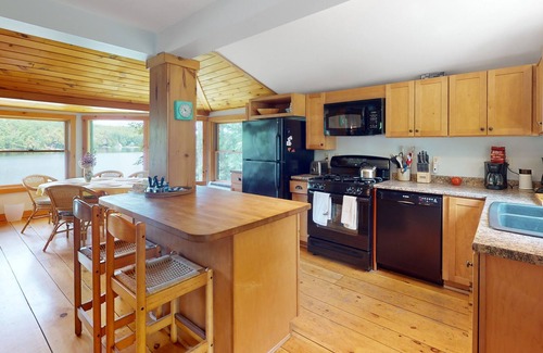 Litchfield Cabina | Lakefront home with firepit, yard, dock/water access, outdoor area, & W/D