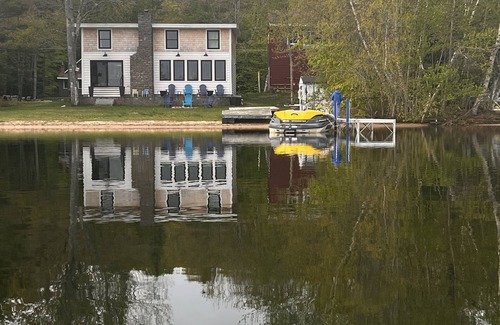 Raymond Casa | Lakefront Living. Kayak while bald eagles soar above and loons call out.