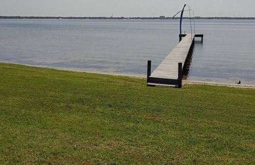 Sebring Casa | Lakefront private home with beach, dock and party area and large back yard