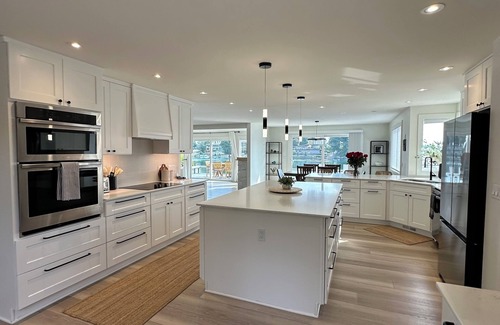 Bonney Lake Casa | Lakefront Retreat with Private Dock's, Stunning Views, fireplaces and hot tub!